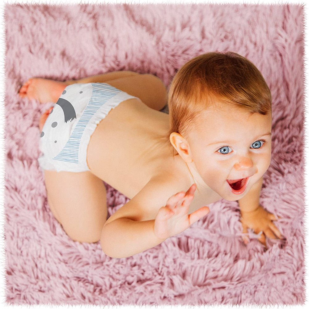 a baby comfortably and happily wearing the healthy baby diapers